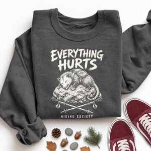 Everything Hurts Possum Sweatshirt