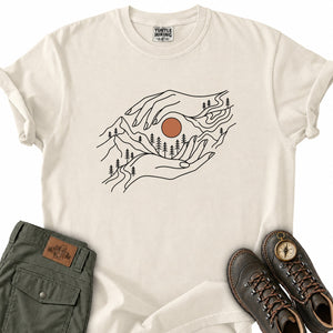 Hands Holding Sun Over Forest T-Shirt